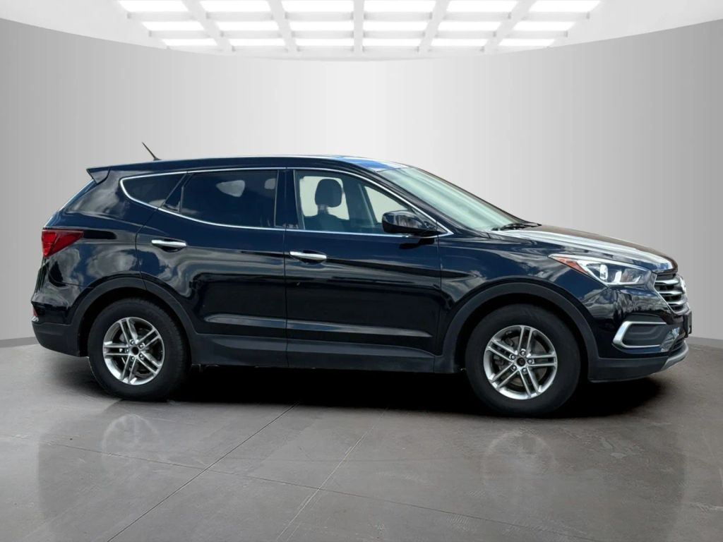 hyundai santa fe 2018 5NMZT3LB6JH107147 image